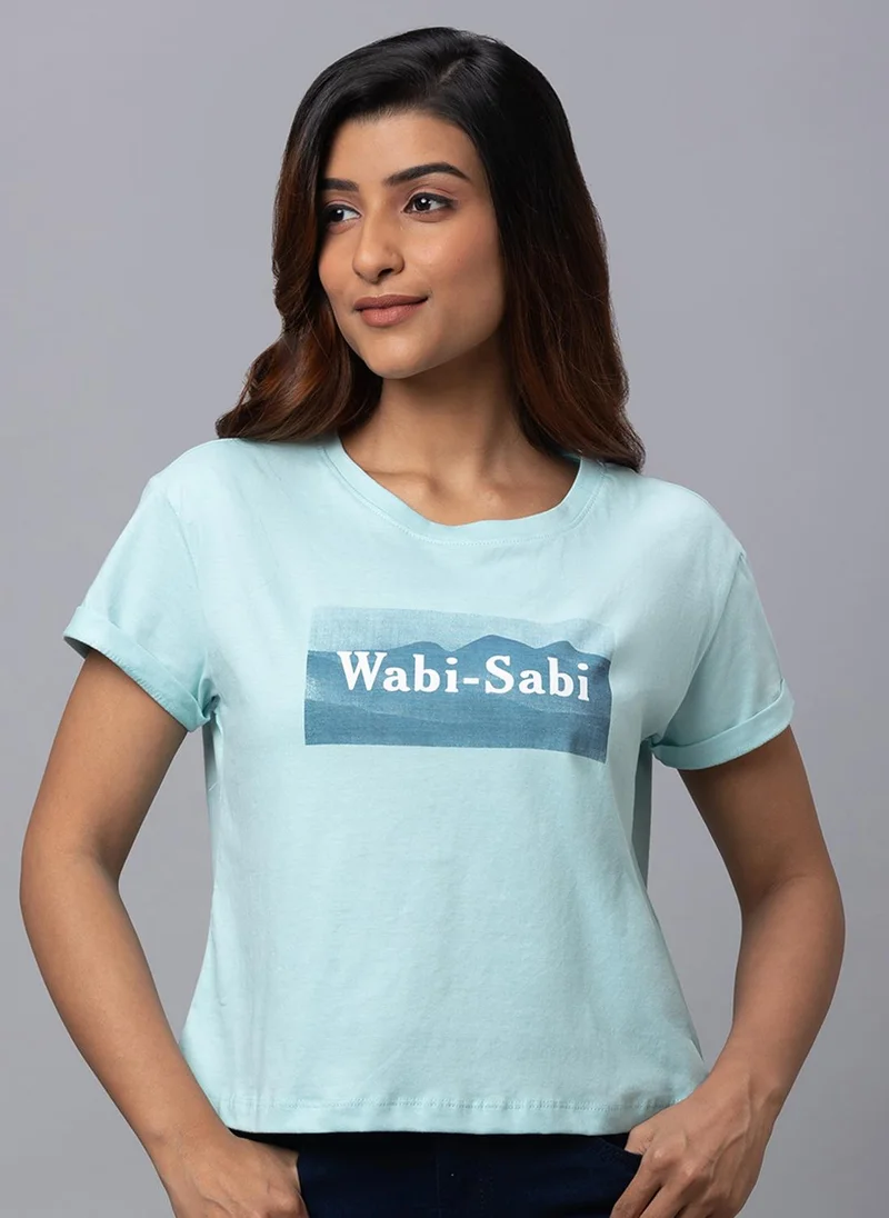 جلو باص تيشيرت نسائي قصير أزرق مطبوع بياقة دائرية بقصة واسعة